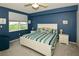 Spacious main bedroom with a king-size bed and water views at 6450 Shoreline Dr # 9405, St Petersburg, FL 33708