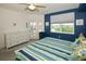 Main bedroom with king bed, water views, and ample dresser storage at 6450 Shoreline Dr # 9405, St Petersburg, FL 33708