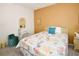 Bright bedroom with a comfortable bed and wicker furniture at 6450 Shoreline Dr # 9405, St Petersburg, FL 33708