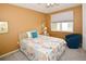 Guest bedroom with a queen bed and coastal decor at 6450 Shoreline Dr # 9405, St Petersburg, FL 33708
