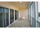 Covered balcony with seating and view of water at 6450 Shoreline Dr # 9405, St Petersburg, FL 33708