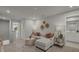 Spacious loft area with comfortable seating, perfect for relaxing or working from home at 31564 Woodland Race Loop, Wesley Chapel, FL 33545
