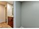 Small bathroom with a vanity, toilet and shower/tub combo at 15215 Amberly Dr # 206, Tampa, FL 33647