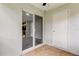 Private patio with tile flooring and access to the interior at 15215 Amberly Dr # 206, Tampa, FL 33647