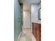 Updated bathroom with a walk-in shower and modern vanity at 15215 Amberly Dr # 206, Tampa, FL 33647
