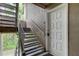 Exterior stairwell leading to a condo entrance at 15215 Amberly Dr # 206, Tampa, FL 33647