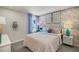 Charming bedroom with playful decor and a comfortable bed at 31556 Woodland Race Loop, Wesley Chapel, FL 33545