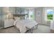 Spacious bedroom with water views and a cozy atmosphere at 31556 Woodland Race Loop, Wesley Chapel, FL 33545