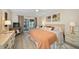 Spacious main bedroom with water views and king-size bed at 2505 Bay Blvd # 1, Indian Rocks Beach, FL 33785