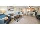Open living space with adjacent kitchen and seating at 2505 Bay Blvd # 1, Indian Rocks Beach, FL 33785
