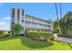 Two-story building with balconies and landscaping at 2505 Bay Blvd # 1, Indian Rocks Beach, FL 33785