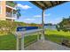 Covered outdoor cleaning station with water views at 2505 Bay Blvd # 1, Indian Rocks Beach, FL 33785