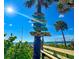 Wooden sign on beach path says 'Please leave nothing but your footprints' at 2505 Bay Blvd # 1, Indian Rocks Beach, FL 33785