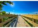 Wooden boardwalk leads to sandy beach at 2505 Bay Blvd # 1, Indian Rocks Beach, FL 33785