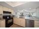 Modern kitchen with granite countertops and stainless steel appliances at 2505 Bay Blvd # 1, Indian Rocks Beach, FL 33785