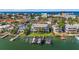 An aerial view of a waterfront property with a boat dock at 2505 Bay Blvd # 1, Indian Rocks Beach, FL 33785