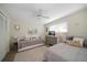 Well-lit guest bedroom with twin beds, dresser, and daybed at 2505 Bay Blvd # 1, Indian Rocks Beach, FL 33785