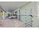 Covered parking with surfboard racks and space for a car and golf cart at 2505 Bay Blvd # 1, Indian Rocks Beach, FL 33785