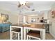 Kitchen with breakfast bar and stainless steel appliances at 2505 Bay Blvd # 1, Indian Rocks Beach, FL 33785