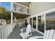 Private deck with outdoor seating and water views at 2505 Bay Blvd # 1, Indian Rocks Beach, FL 33785