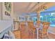 Farmhouse-style dining area with wooden table and bench seating at 4923 Willow Ridge Ter, Valrico, FL 33596