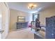 Bedroom with dresser, bed, and workspace at 4923 Willow Ridge Ter, Valrico, FL 33596
