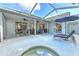 Spacious patio with seating and a swimming pool at 4923 Willow Ridge Ter, Valrico, FL 33596