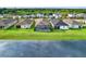 Aerial view of homes near a lake at 14424 59Th E Cir, Bradenton, FL 34211