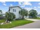 House exterior showcasing landscaping and a driveway at 402 E Emma St, Tampa, FL 33603