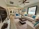 Bright living room features an open floor plan and modern furniture at 402 E Emma St, Tampa, FL 33603