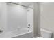 Clean bathroom featuring a tiled bathtub and shower combination at 3147 Calvano Dr, Land O Lakes, FL 34639