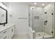 Contemporary bathroom with a walk-in shower and white vanity at 6605 N Nebraska Ave # 1, Tampa, FL 33604