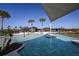 Resort-style pool with shade structures and a fun water feature for  at 31570 Woodland Race Loop, Wesley Chapel, FL 33545