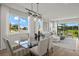 Open concept dining area adjacent to the kitchen and living room at 31570 Woodland Race Loop, Wesley Chapel, FL 33545