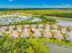 Community overview showcasing a row of single-Gathering homes at 20983 Fetterbush Pl, Venice, FL 34293