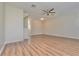 Large living room featuring hardwood floors and a ceiling fan at 2935 Bayshore Pointe Dr, Tampa, FL 33611