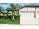 Single Gathering home with two-car garage and landscaping at 14117 Weddington Ter, Hudson, FL 34669