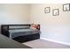 Bedroom with daybed, drawers, and musical art at 14117 Weddington Ter, Hudson, FL 34669