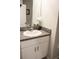 Clean bathroom with granite countertop and white cabinets at 14117 Weddington Ter, Hudson, FL 34669