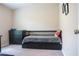 Bedroom with daybed, dresser, and carpet at 14117 Weddington Ter, Hudson, FL 34669