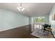 Bright living room with hardwood floors and access to the patio at 2295 Americus E Blvd # 27, Clearwater, FL 33763