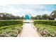 Landscaped area featuring a large globe statue at 2295 Americus E Blvd # 27, Clearwater, FL 33763