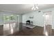 Spacious living room with hardwood floors and large windows at 2295 Americus E Blvd # 27, Clearwater, FL 33763