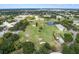 Aerial view of community with green space and buildings at 2295 Americus E Blvd # 27, Clearwater, FL 33763