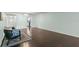 Bright living room features hardwood floors and an open floor plan at 2295 Americus E Blvd # 27, Clearwater, FL 33763