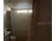Bathroom featuring a shower/tub combo at 10542 Helena St, New Port Richey, FL 34654