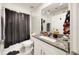 Bathroom with granite countertop and Halloween decor at 15407 Miller Creek Dr, Sun City Center, FL 33573