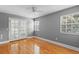Inviting bedroom with hardwood floors, neutral walls, and french doors to create a peaceful atmosphere at 45 Adalia Ave, Tampa, FL 33606