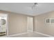 Neutral bedroom with a bathroom located behind one door and another walk-in closet located behind the other door at 45 Adalia Ave, Tampa, FL 33606