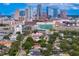 Stunning city skyline view with modern high-rises towering over a mix of residential areas and lush green trees at 45 Adalia Ave, Tampa, FL 33606